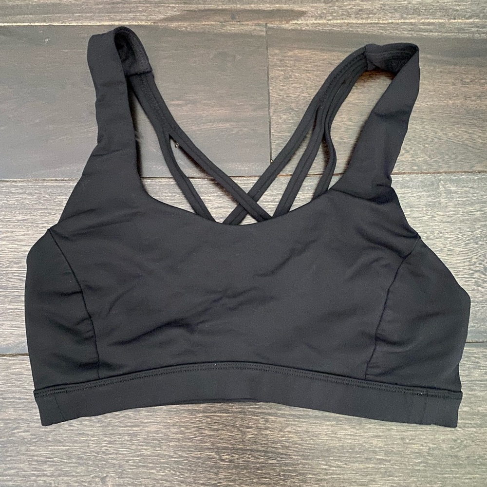 Size 6 Lululemon black sports bra with cute straps in back